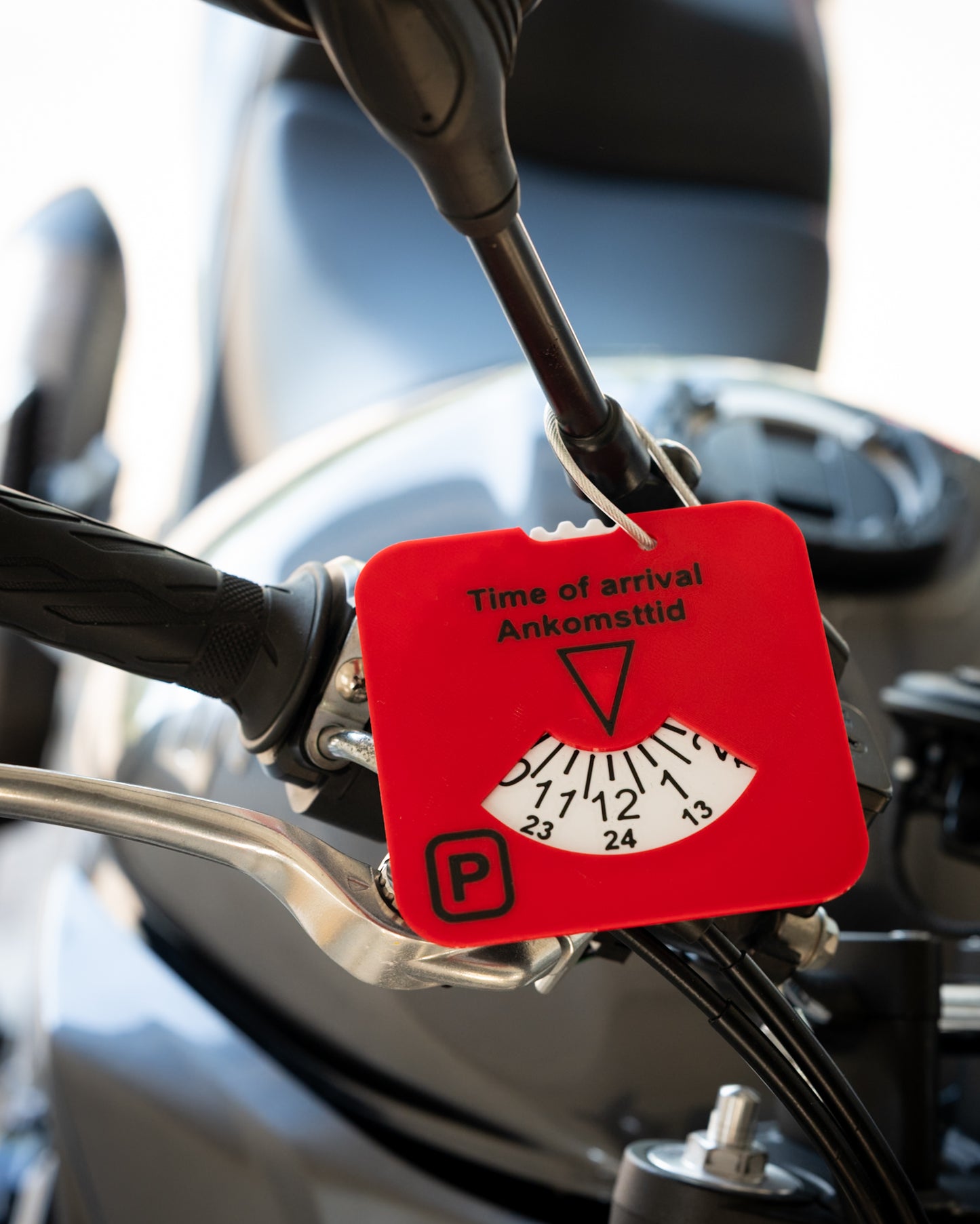 Låsbar P-skiva för motorcykel och moped